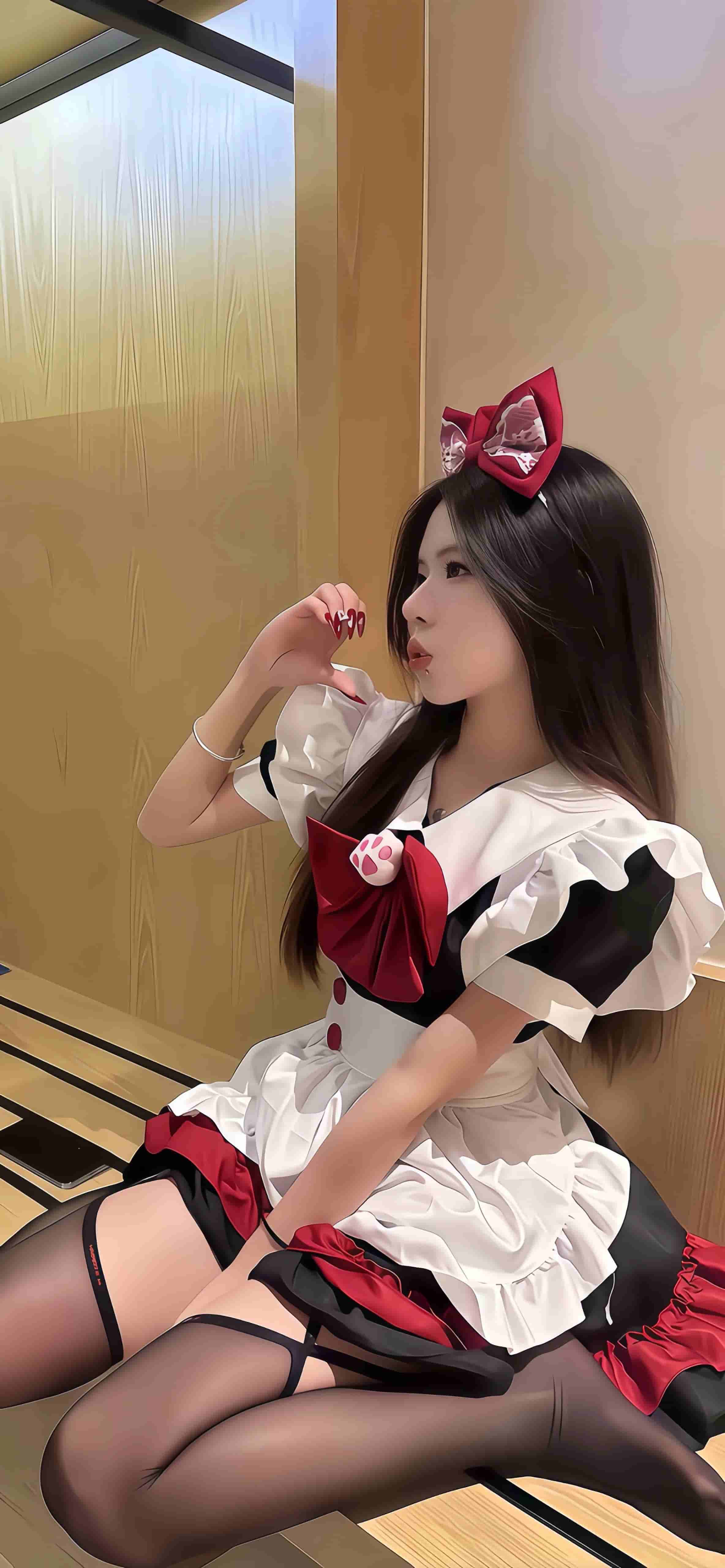 原神胡桃女仆装女孩侧坐比心手机壁纸